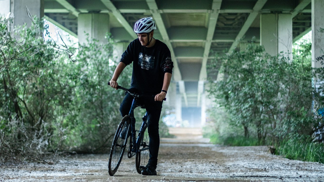 riding bike on rough terrain off road cycling route